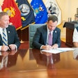 Georgia Southern Vice President for Enrollment Management Scot Lingrell and Vice President for University Advancement Trip Addison and The Landings Military Family Relief Fund Inc. Board of Directors Chairman Bob Longueira sign an agreement for a new scholarship fund designed for spouses of military service members.