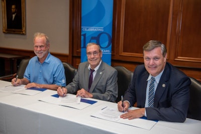 Tim and Robert Jans (from left), with Elmhurst University president Dr. Troy D. VanAken, recently approved a $3.4 million gift that will enable more students to explore careers in the military and support student veterans at Elmhurst